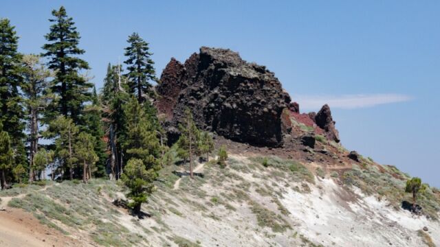Volcanic plug. The main trail goes left of the plug, through the trees. Barker Pass