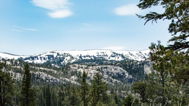 View of the snow-capped mountains at the high point, before going down to the lake area Big Meadow trail