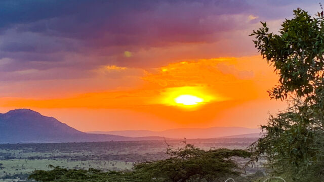 Sunset from the porch of our tent at Cottar's Camp